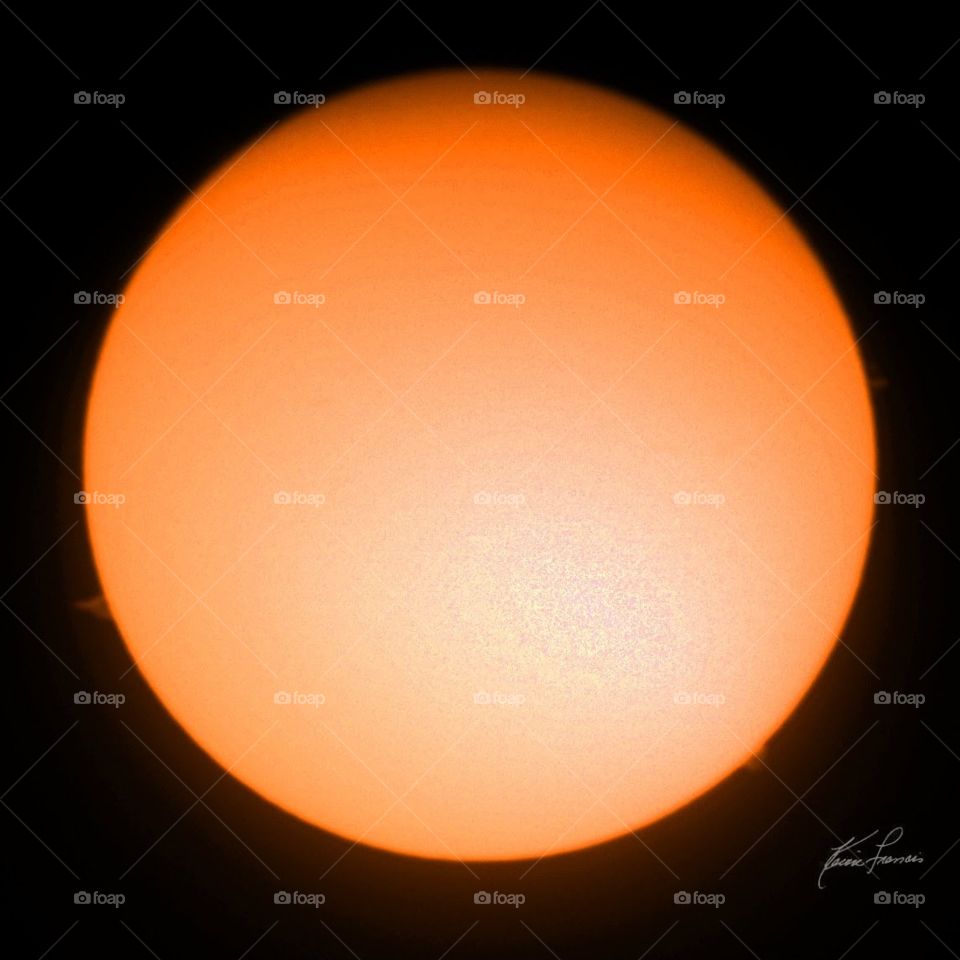 Sun with 3 prominences