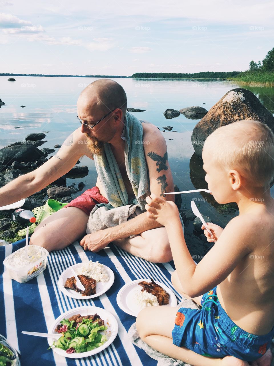 Family having picnic at the lake