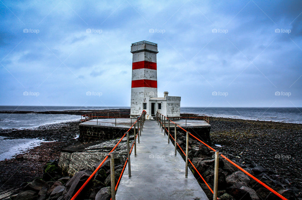 Lighthouse on seashore, Iceland