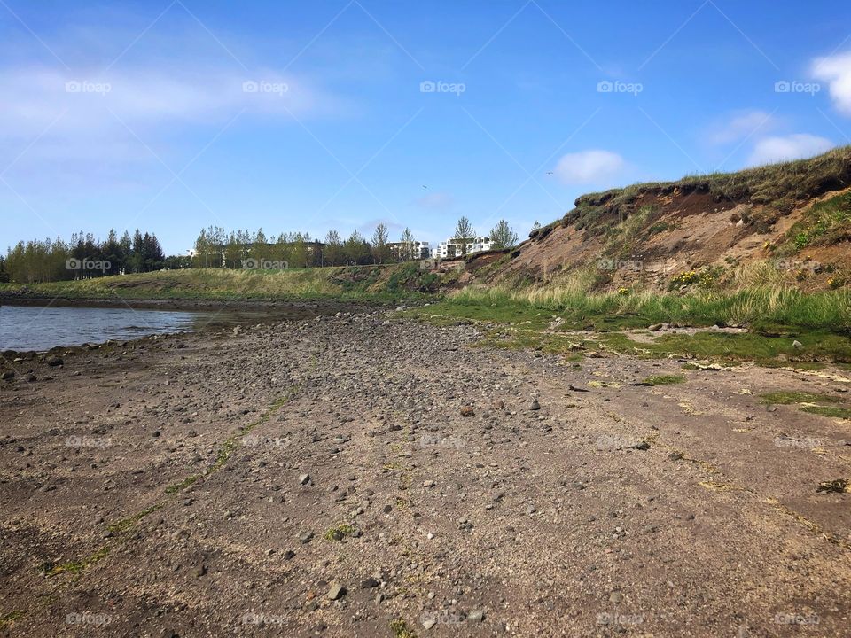 A stony beach for the soft in heart.  A walk along the beach a universal commonality in seeking true love.