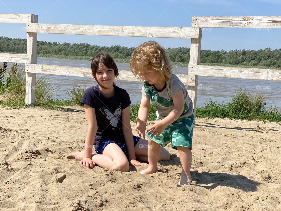 Kids playing on the beach 
