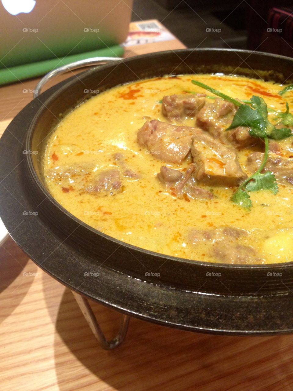 Curry with meat in a bowl closeup