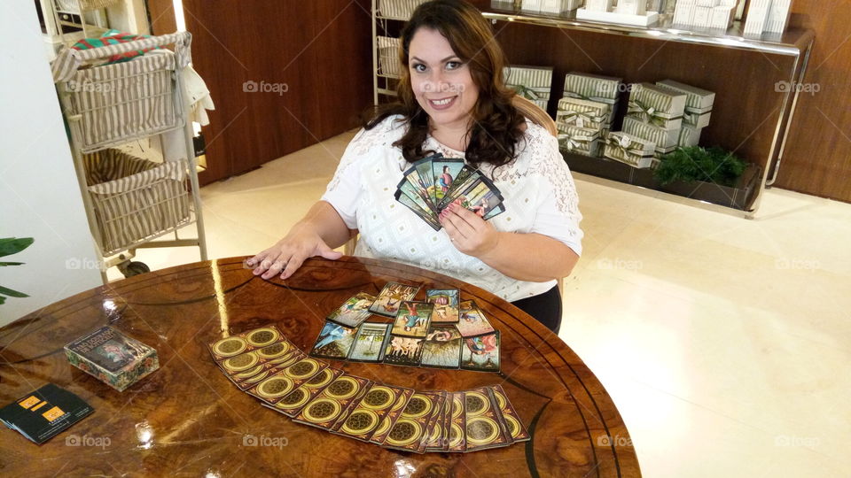 Woman playing with cards