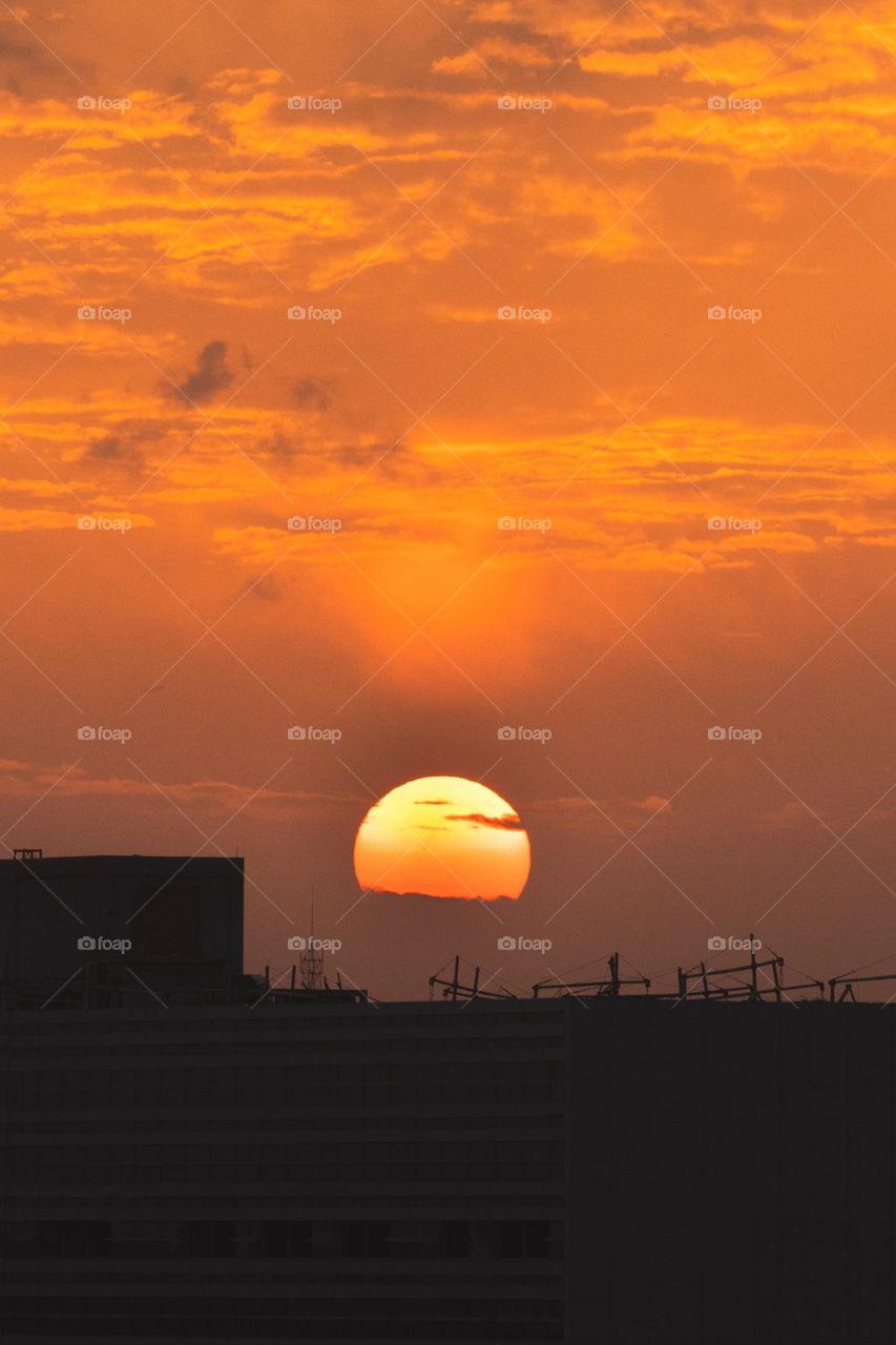 Silhouette of building during sunset