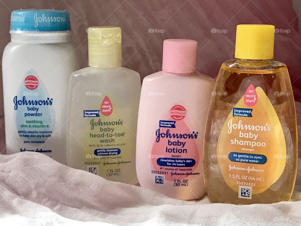 Johnson and Johnson baby products with a soft pink background