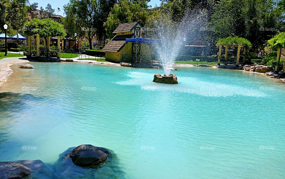 Peaceful Pond. Shallow pond with fountain.