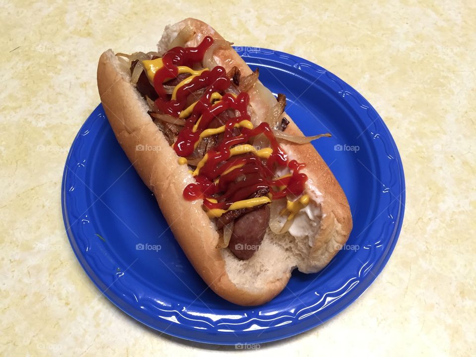 Hot dog with ketchup and mustard 