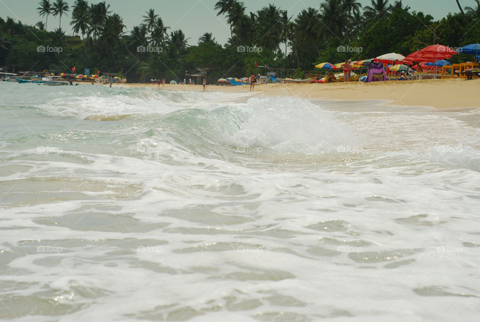 Ocean coast, water foam 