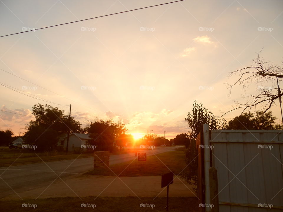 sunrise 🌅 2. This is a picture I took of the sun coming up early in the morning. 👣 🚶 🏃 🔥 💨