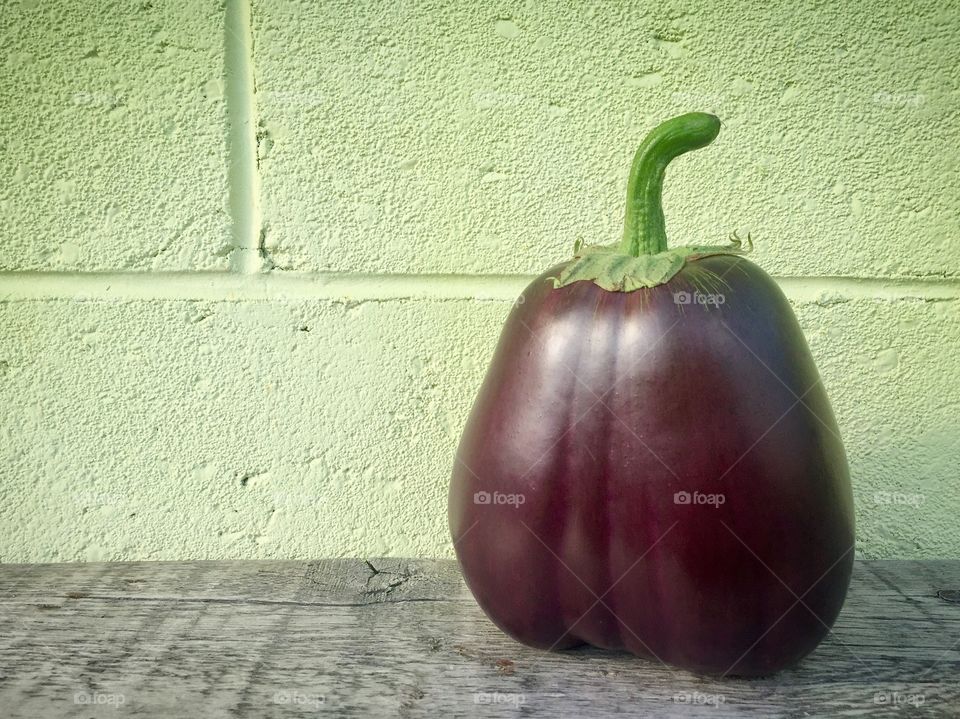 Eggplant on a ledge 