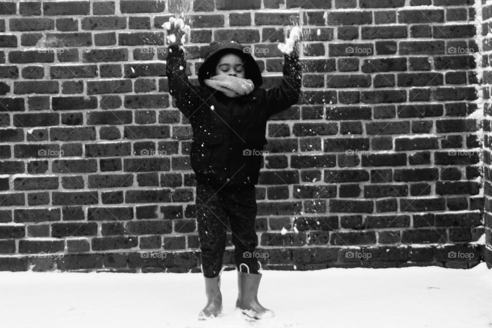 My son having fun in the snow 