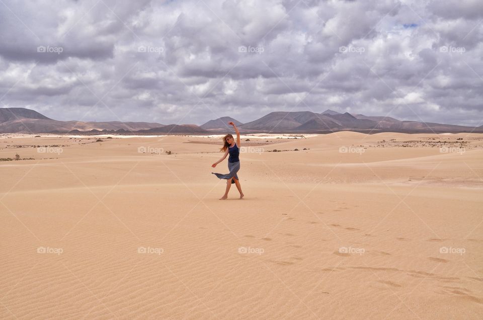 freedom in sandy dunes of corralejo on fuerteventura canary island in spain