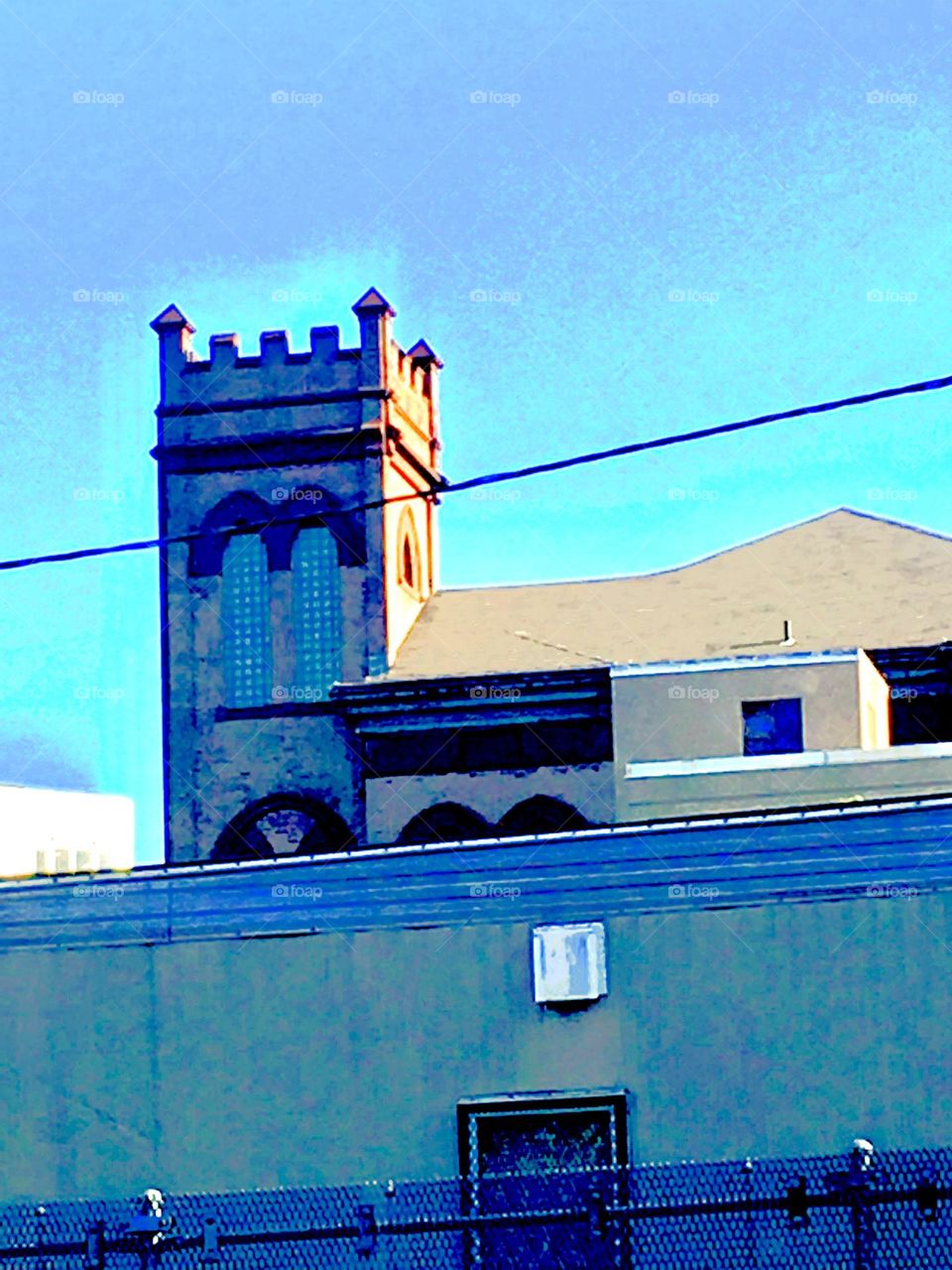 This beautiful building appears to be a house of worship. Due to its tower it could be a church. However, the flat roof of the tower and the stylish multifaceted ornaments point towards the possibility of it being a mosque. 2020. Hypnotic Productions