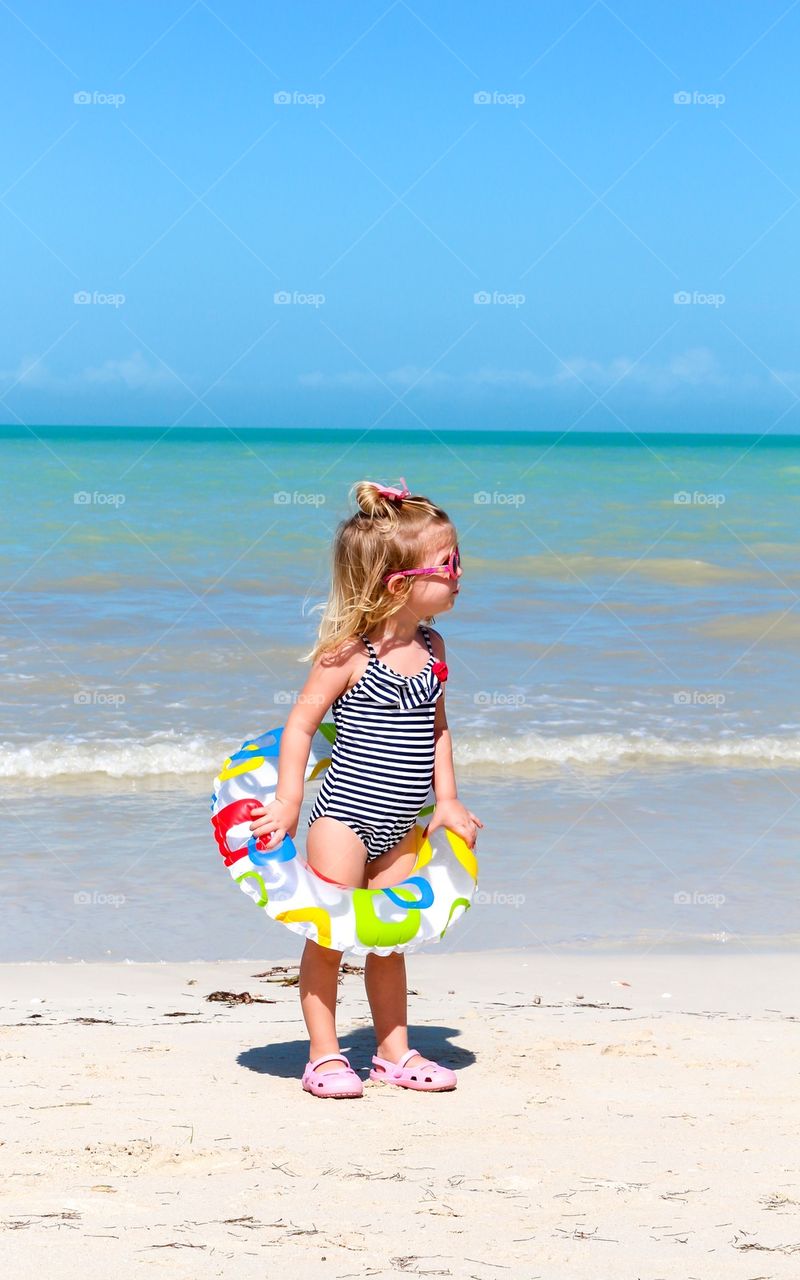 Child having fun at the beach