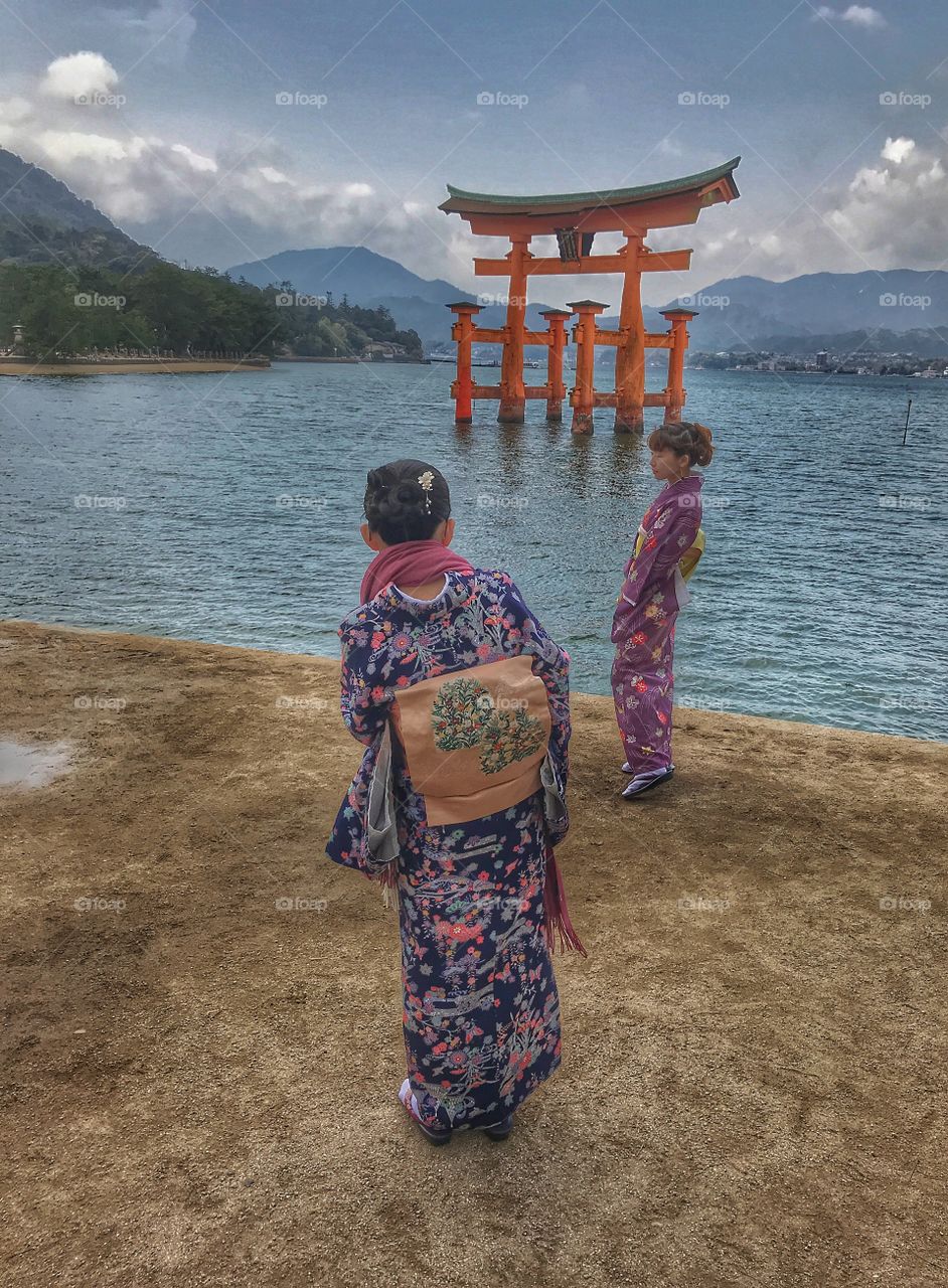 Girls at Tori gate, Miyajima island 