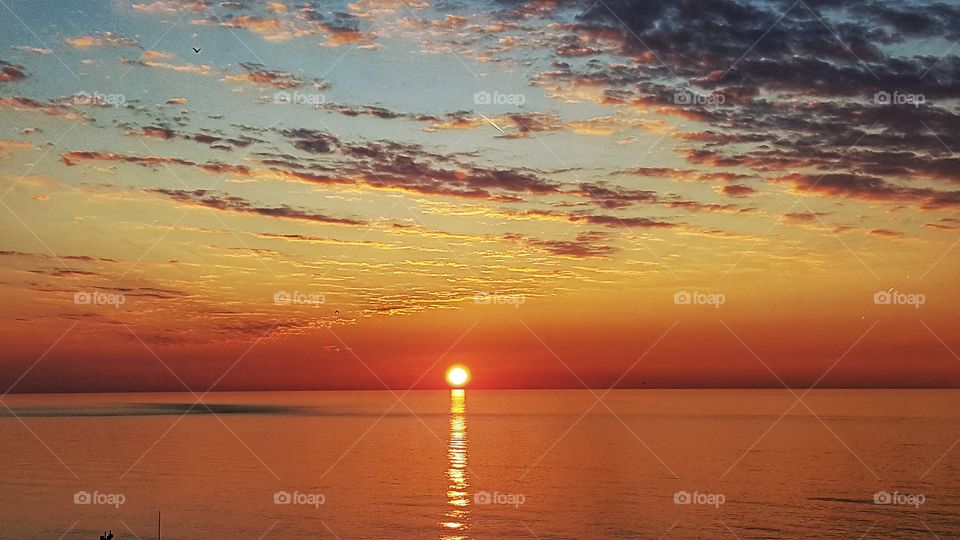 beautiful fiery sunset on the sea