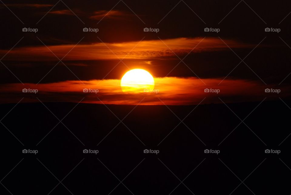 Scenic view of sun at sunset