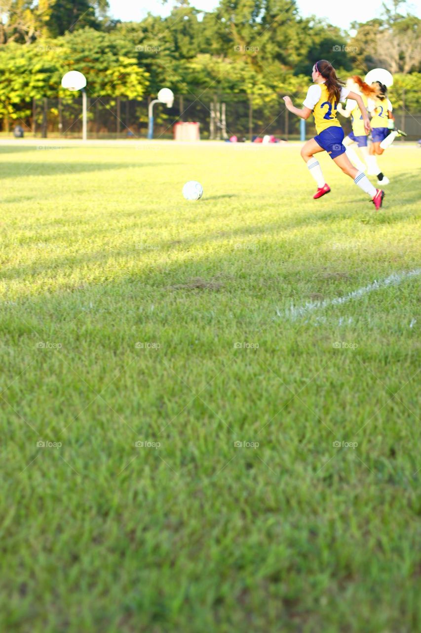 GIRL ON SOCCER FIELD