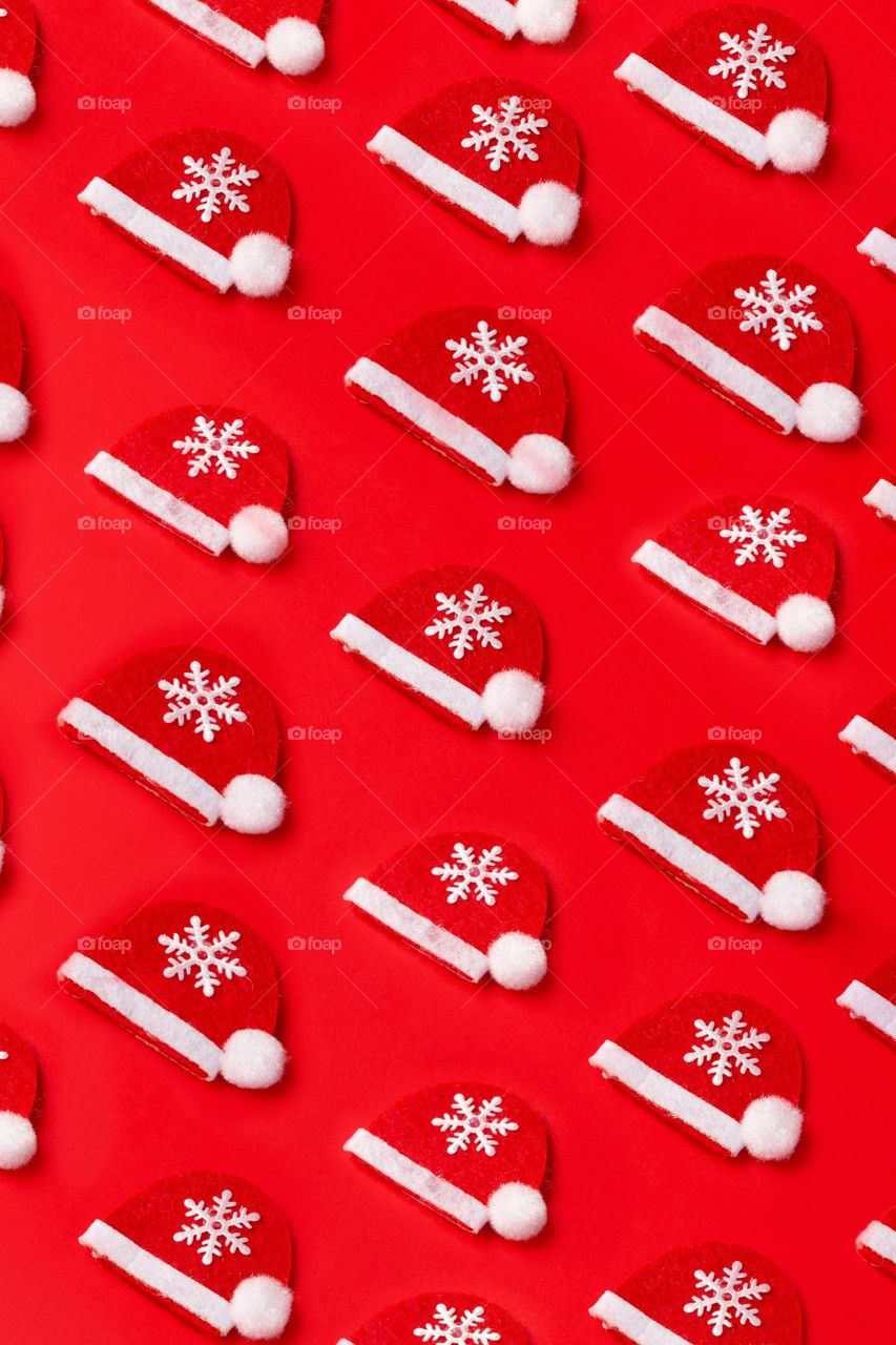 Flat Lay Of Felt Fabric Santa Hats