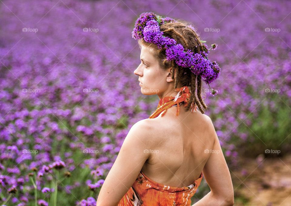 beautiful woman in spring blossom trees