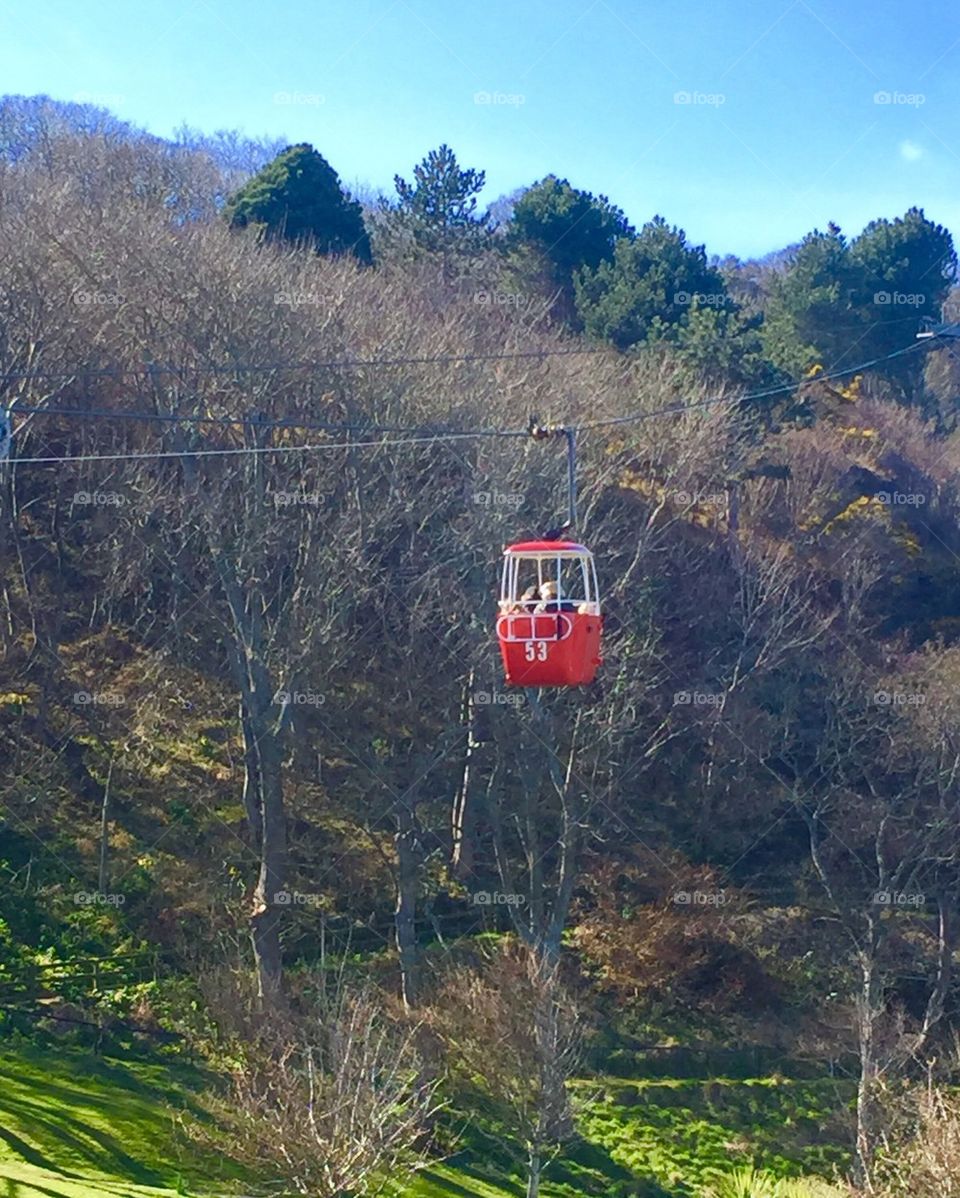 People enjoying spring mission . Ski lift 