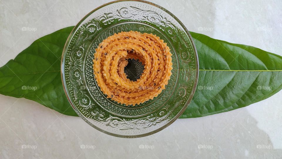 The Circle of Snacks, murukku, a snack usually made of rice or urad dal flour, formed into a twisty shape, Indian snacks