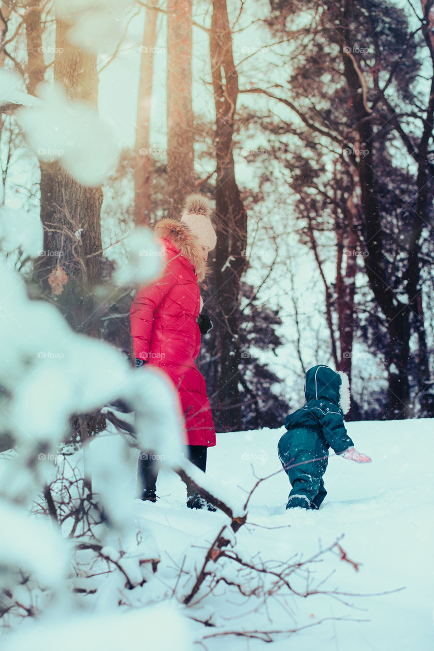 Winter with friends. Spending wintertime outdoors playing with snow