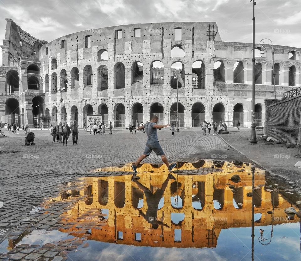 stepping A to B in front of colosseum - Rome