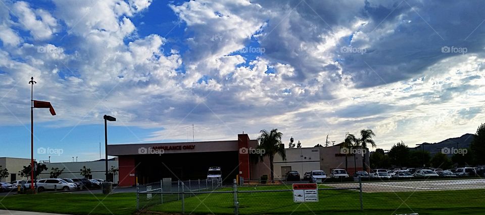 ambulances only. inland valley level 1 trauma center with beautiful clouds just before sunset