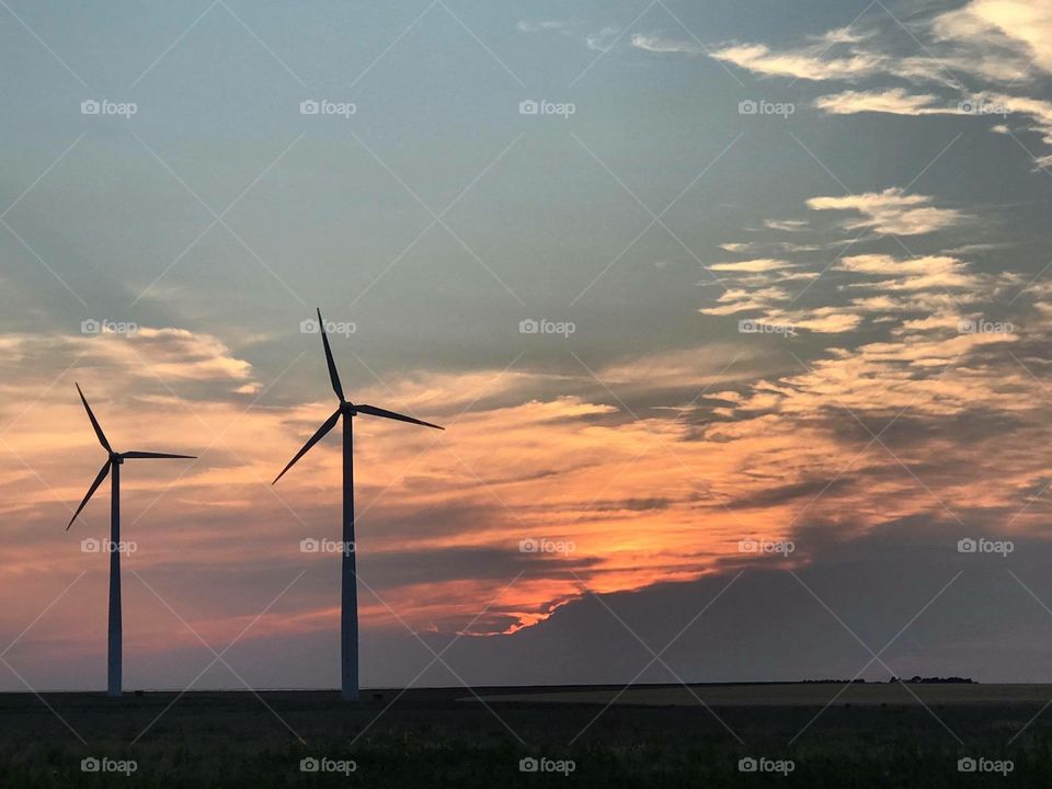 Kansas sunset with windmill