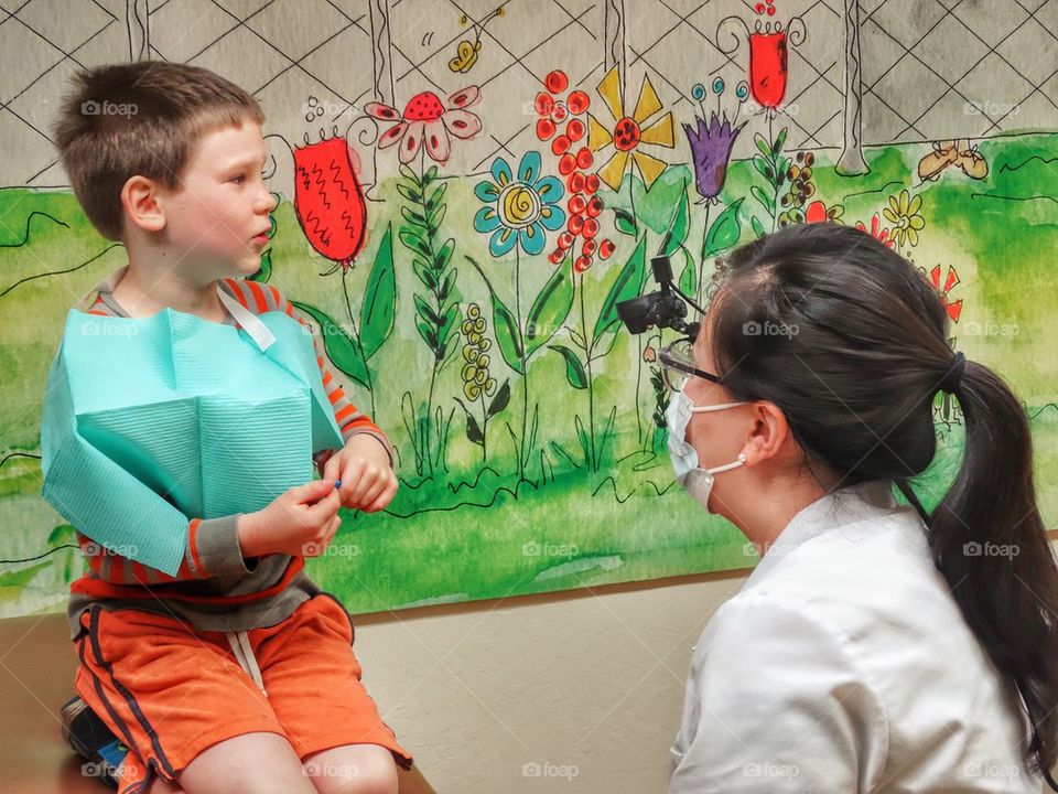 Young Boy Visiting The Doctor For A Check-Up. First Visit To The Dentist