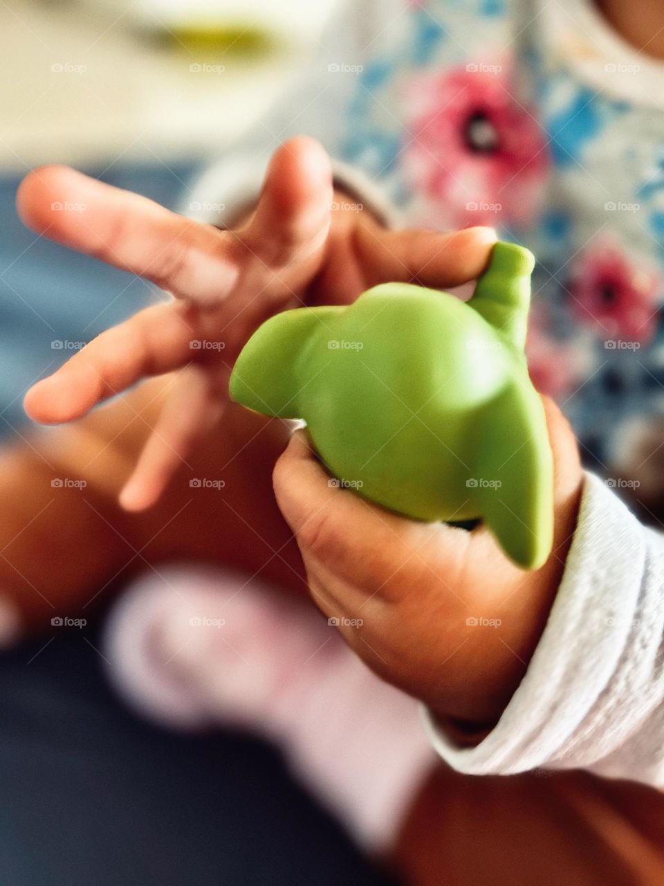 little hands and their favorite toy