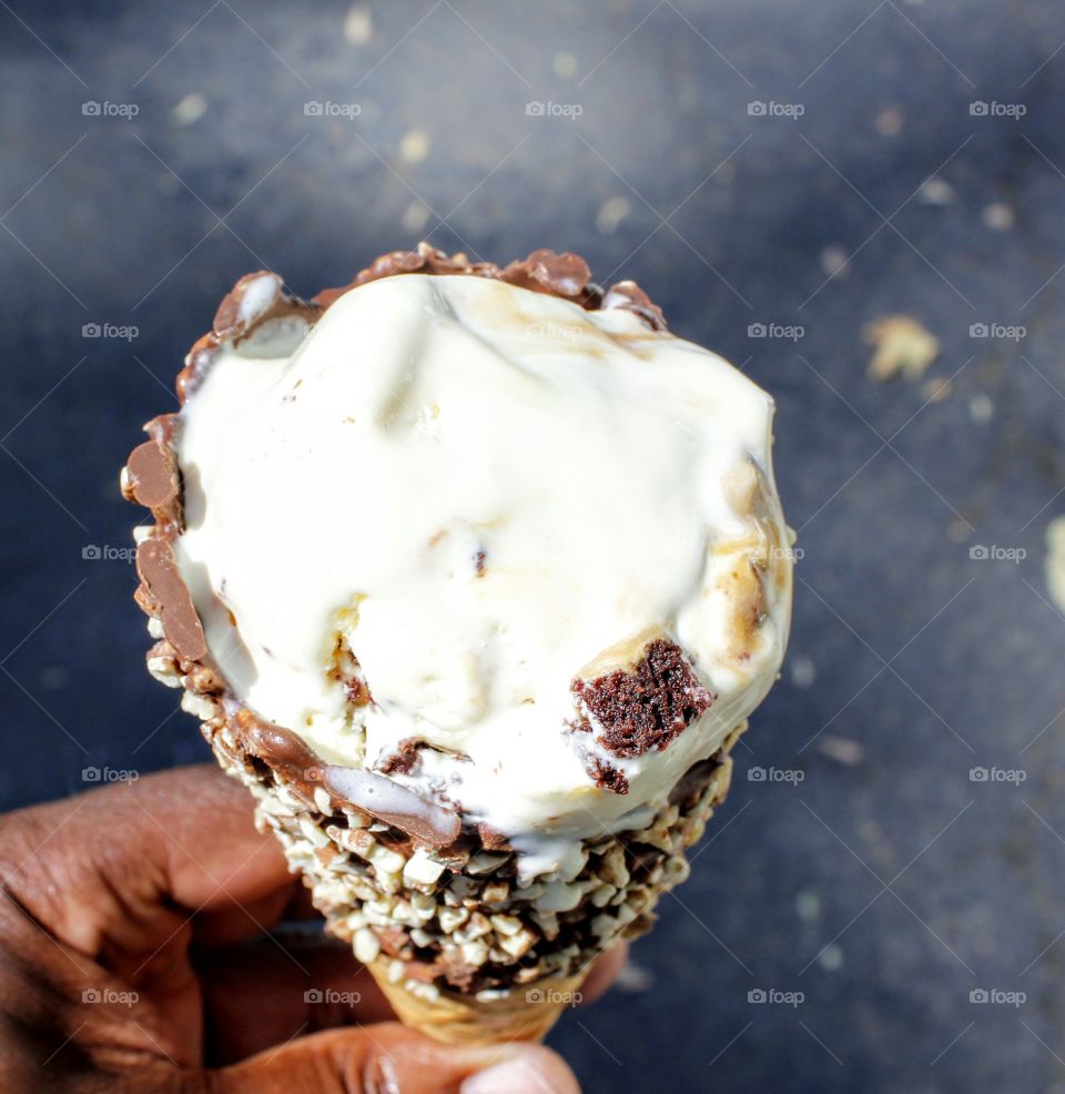 melted ice cream on a waffle cone