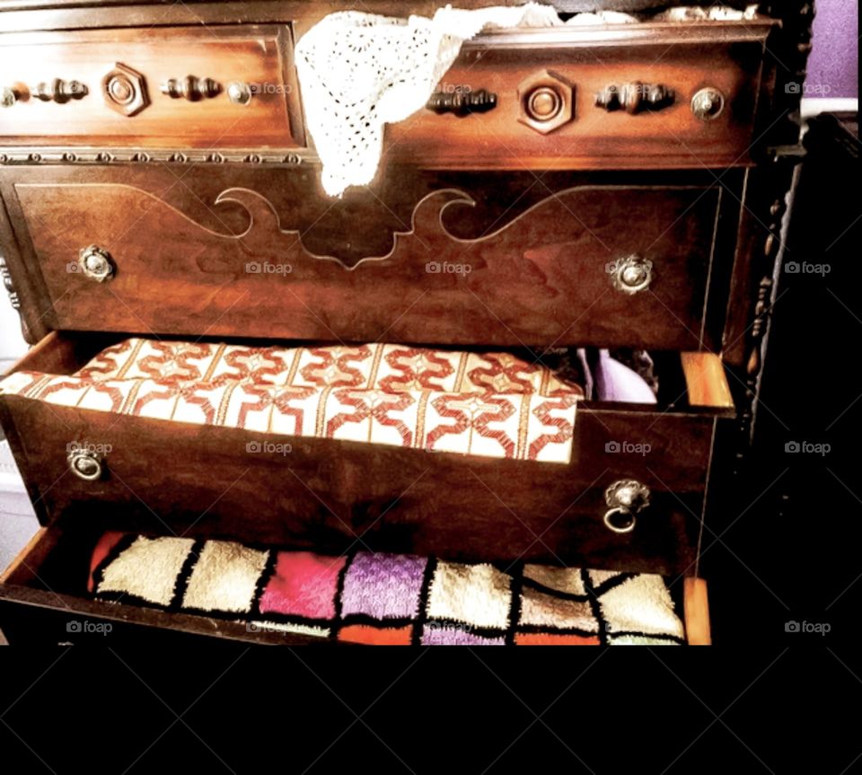Vintage hand made items in antique dresser