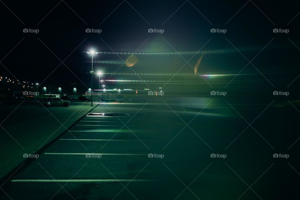 night parking / green light / blur / empty street / night time / night lights 