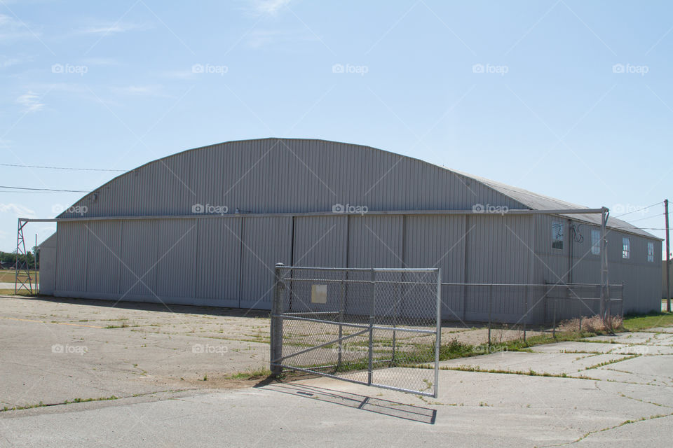 airplane hanger. a hanger at the local airport