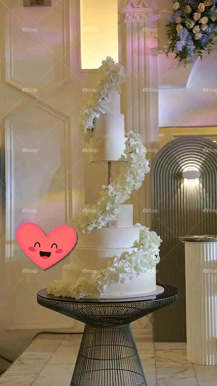 A very beautiful picture, and there is no better picture than it. There is no better picture of green herbs and colorful, red and white roses than it. Glory be to God, the natural and picturesque view, and there is no more