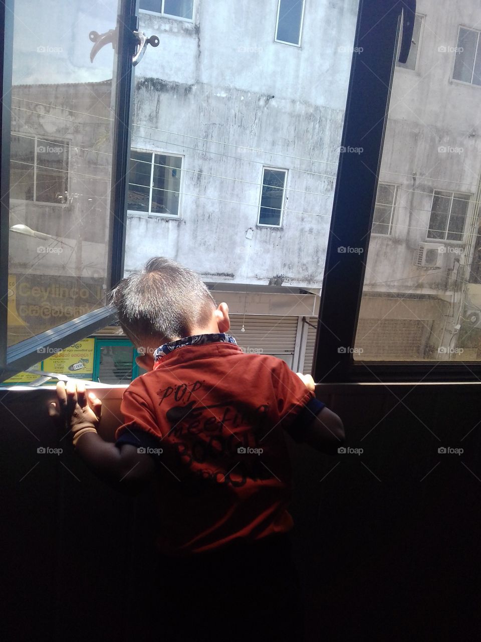 Baby Looking Out Side..