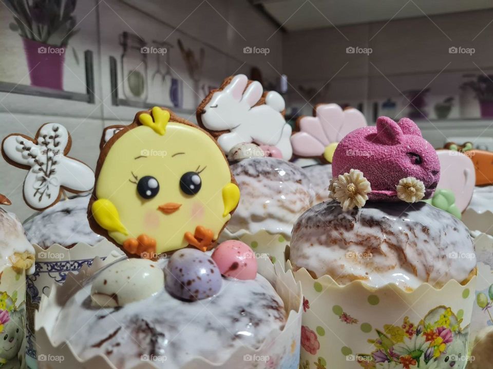 sweet Easter bread with raisins decorated with gingerbread cookies