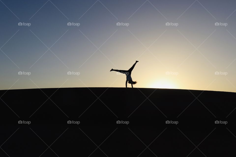 Dansing on sand dunes in the desert