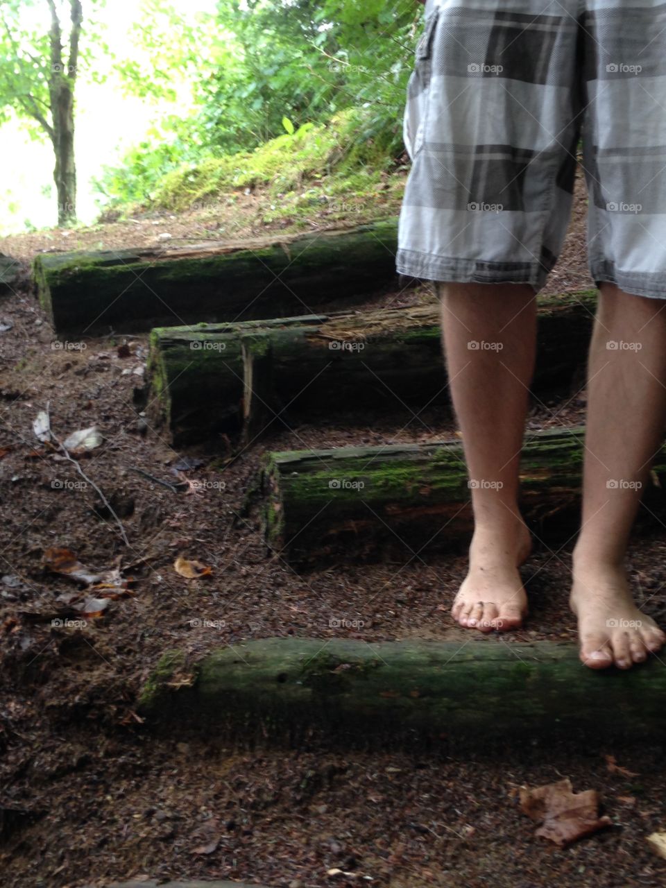 Walking barefoot in the woods