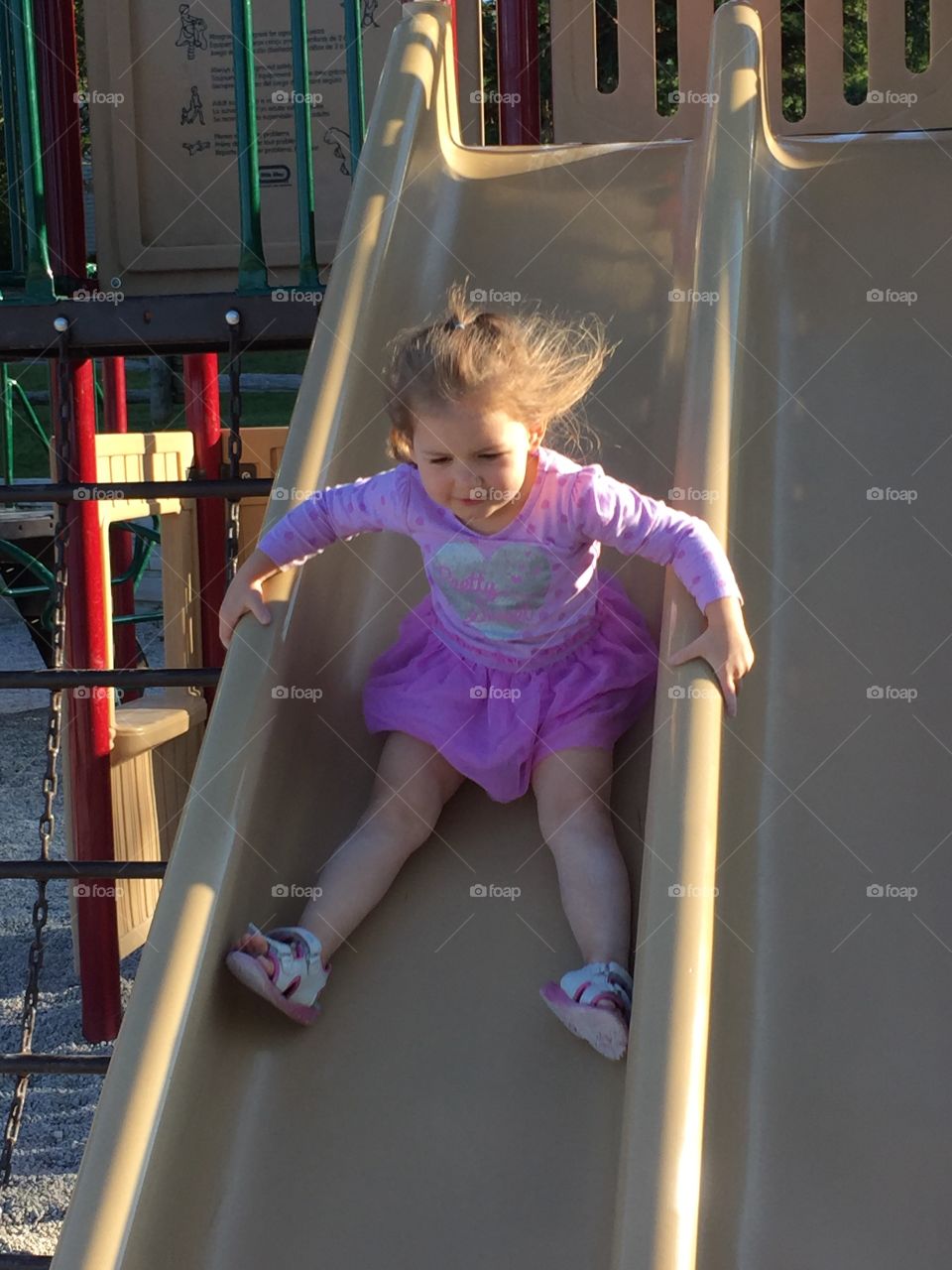 Sliding Down A Slide