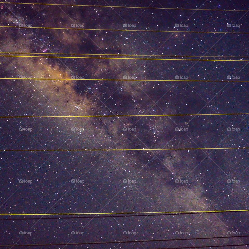 Milky way behind wires