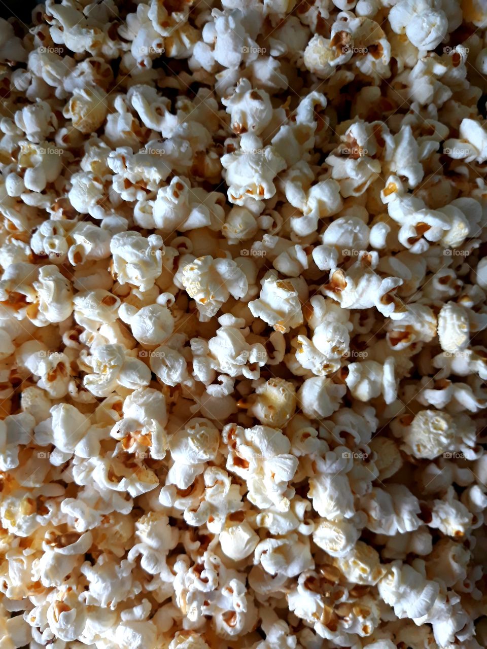 Popcorn! Who doesn't like the smell of popcorn? I like mine plain with a dash of salt.