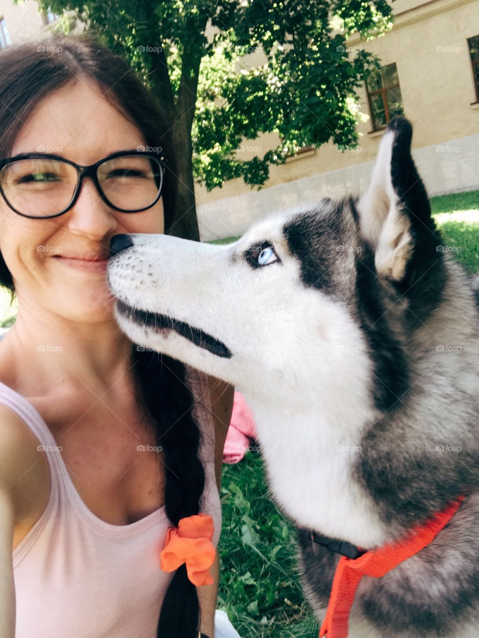 Girl with dog having fun time