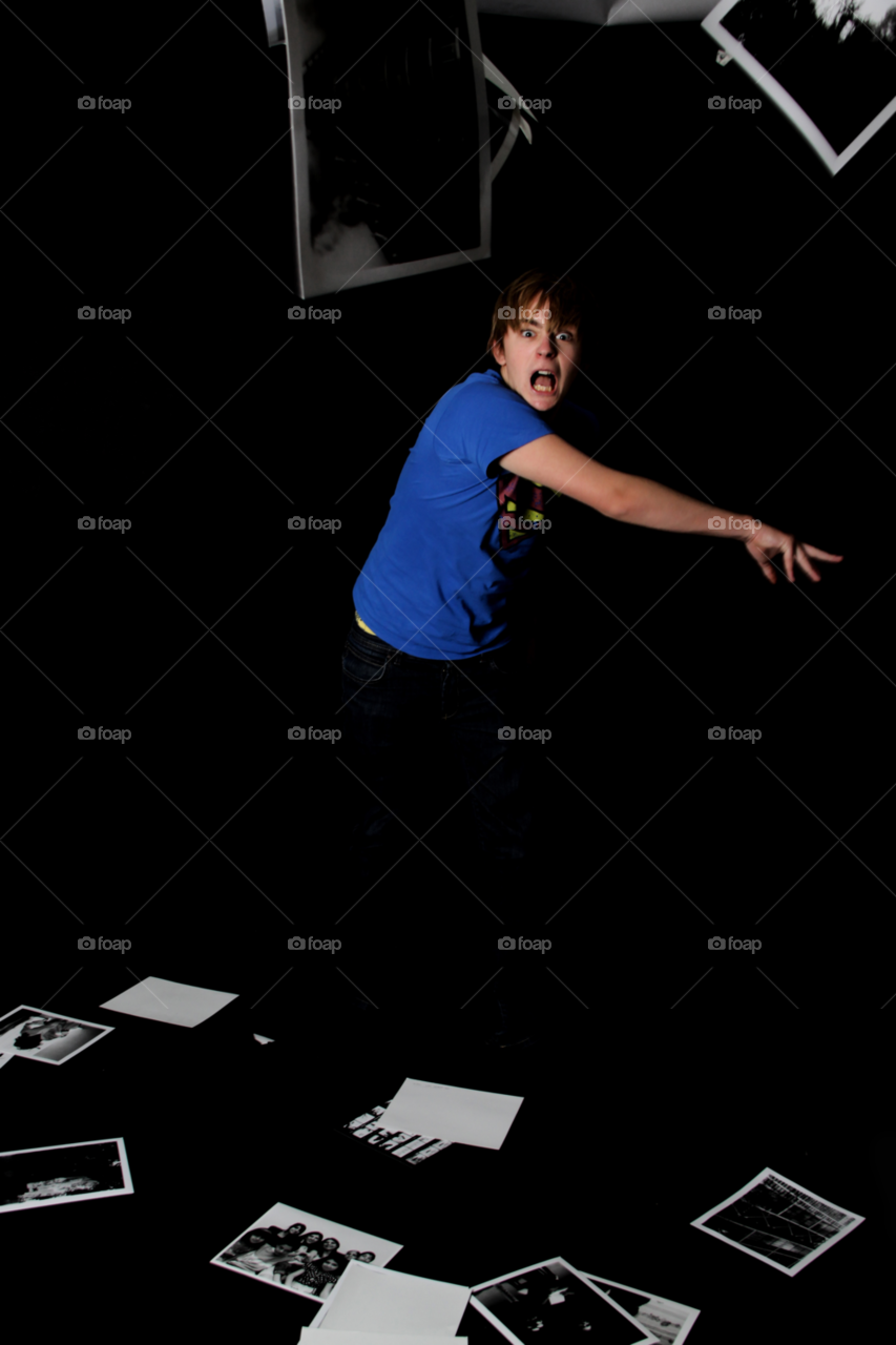 angry darkness throwing prints by divine