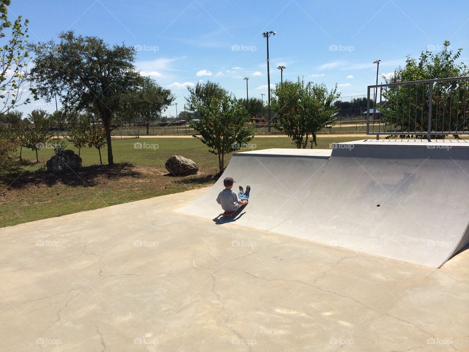 Skateboarding sitting down 