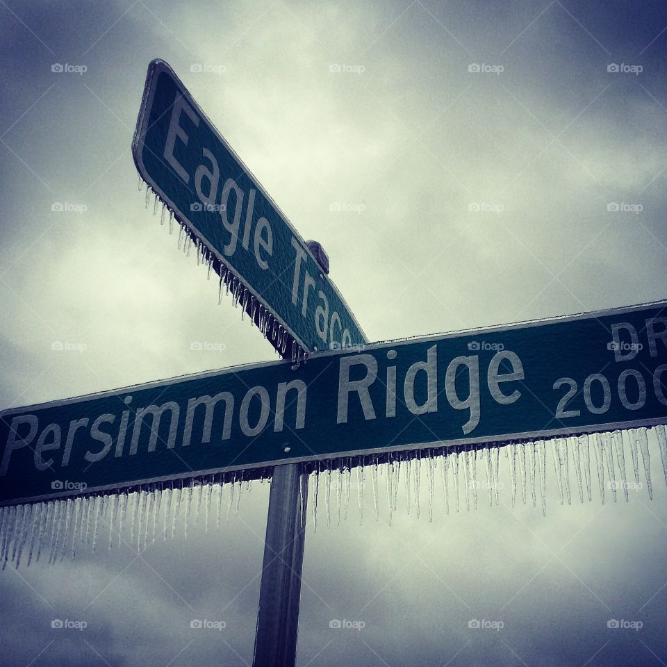 Frozen street sign