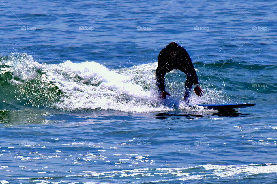 Surfing on the beach 












