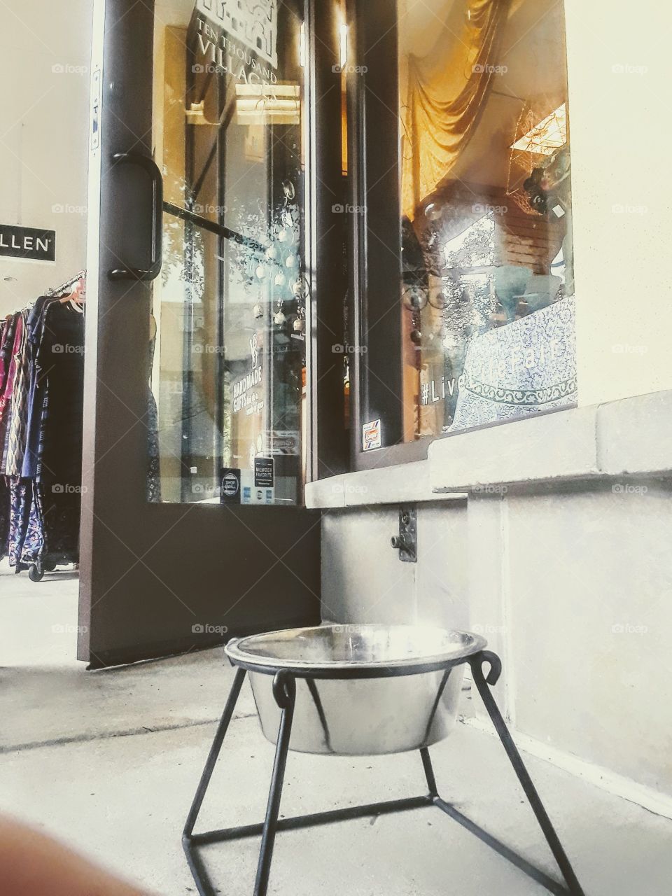 water bowl placed next to boutique